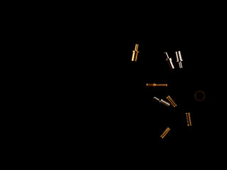 Minimalist backdrop with isolated small connection pieces from hardware reparation