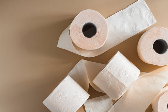 toilet paper chaos peach beige color on beige background