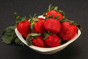 Ripe sweet strawberry with leaf