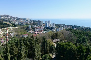 Fototapeta na wymiar top view of the spring panorama of the southern city with sea and mountain horizon