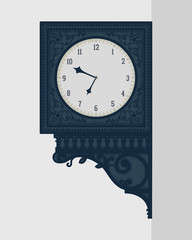 The Wall clock in a vintage style shows a precise time. The rich decorated clock hangs on the wall.	