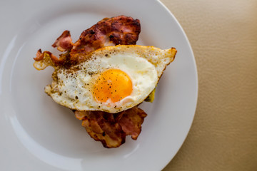 close up of avocado toast for breakfast with fried egg