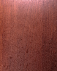 Texture piano in legno con gocce d'acqua