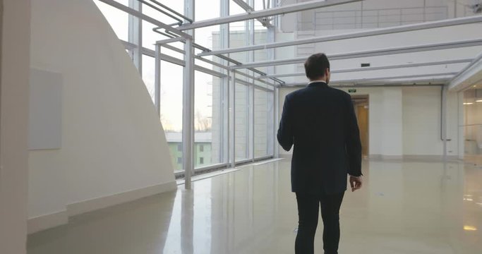 Realtor examining space for rent before meeting with clients