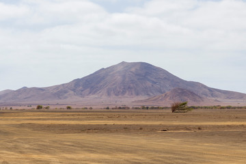 Fototapeta na wymiar Mountains in the desert on the island of Sal, Cape Verde