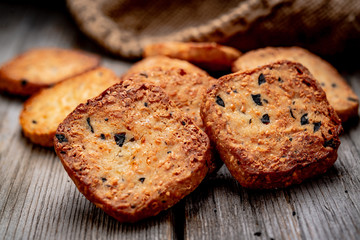 Salted crispy crackers with sesame and sunflower seeds