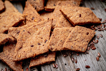 Salted crispy crackers with sesame and sunflower seeds