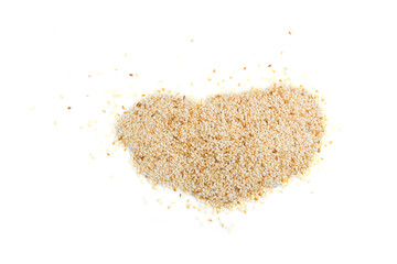 Heap of sesame seeds isolated on white background, top view.