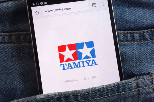 KONSKIE, POLAND - JUNE 01, 2018: Tamiya website displayed on smartphone hidden in jeans pocket