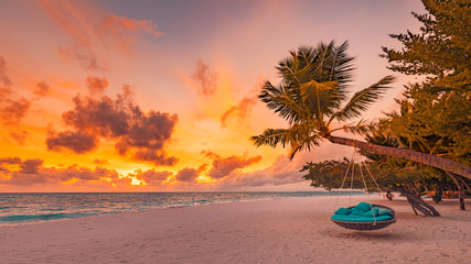Tropical beach sunset as summer landscape with luxury resort beach swing or hammock and white sand...