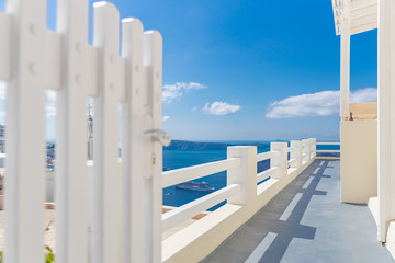 Traditional white Greek architecture, Santorini island, Greece. Beautiful details of the island of Santorini, white house with old door or gate the Aegean Sea.