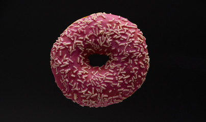 Donut - close up of a pink doughnut - food photography