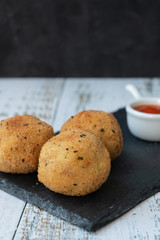 potato balls with tuna and onion