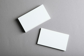 business cards on a colored background top view. Place to insert text