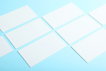 business cards on a colored background top view. Place to insert text