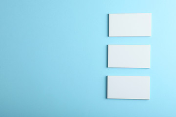 business cards on a colored background top view. Place to insert text