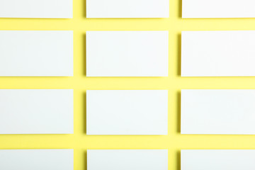 business cards on a colored background top view. Place to insert text