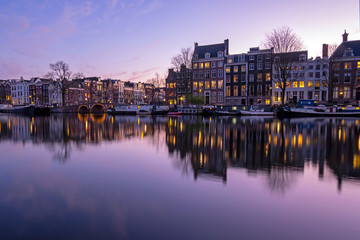 Fototapeta na wymiar City scenic from Amsterdam at the Amstel in the Netherlands at sunset