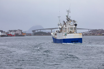 Fishingboat through Brønnøysundet, Nordland county
