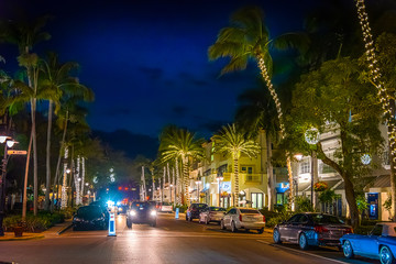 Cars on Fifth avenue in Downtown Naples at night