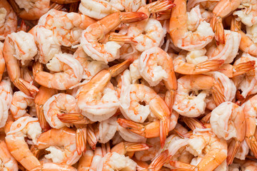 Boiled and peeled shrimps background