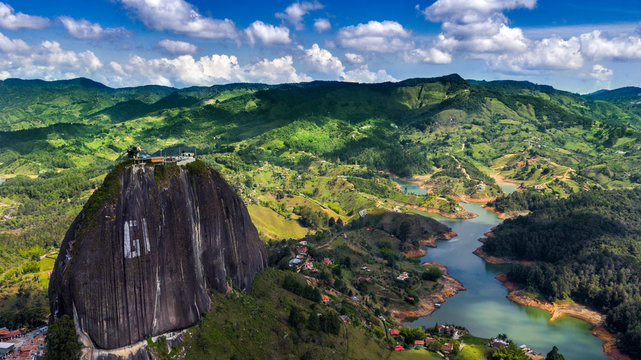 Piedra del Peñol in Guatapé, Colombia. Natural paradise and wonder a giant rock nearby Medellín. Beautiful rivers, lakes and green mountains decorate colombian landscape. Wanderlust travel destination
