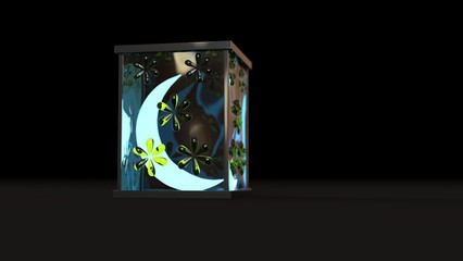 Decorative Arab lantern with candle in the form of a crescent moon glowing at night and lights of shiny golden bokeh. Celebratory greeting card, invitation for the holy month of Ramadan. Dark backgrou