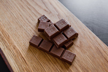Chocolate slice on a wooden surface