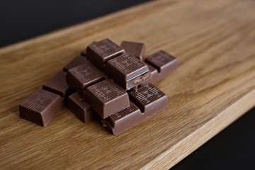 Chocolate slice on a wooden surface