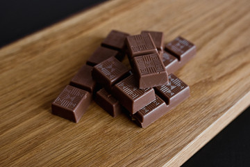 Chocolate slice on a wooden surface
