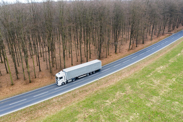 a truck on a country street from above