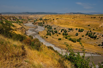 Central Asia, Kyrgyzstan. Picturesque canyons in the Chon-Kindyk river valley along the Pamir highway.