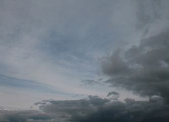 Naklejka na ściany i meble cloudy sky and billowing clouds