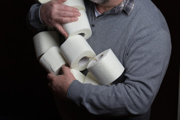Toilet paper in man hands, coronavirus panic