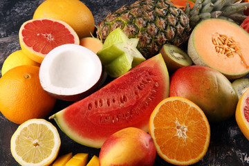 Tropical fruits background, many colorful ripe fresh tropical exotic fruits