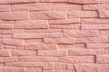 Fototapeta premium Texture of modern stone fence, abstract wall background