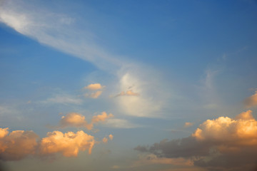 Naklejka na ściany i meble Cloudy blue sky background at dusk