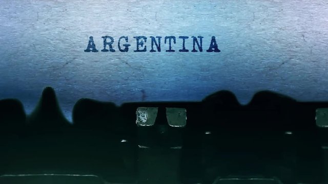 ARGENTINA Word closeup Being Typing and Centered on a Sheet of paper on old vintage Typewriter mechanical 4k Footage Background Animation.