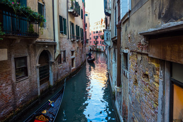 Fototapeta na wymiar Narrow streets - canals in Venice