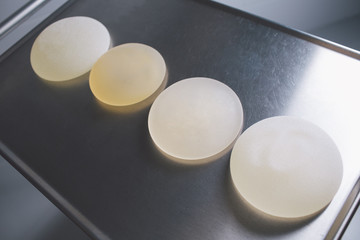 Silicone breast implant on the hospital table.