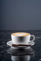 Coffee, espresso in white cup of marble table background. Top view. stock photo