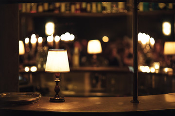 retro vintage lamp in pub interior, bar or restaurant