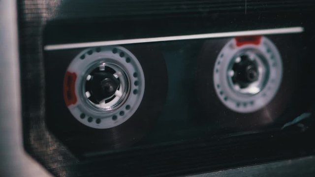 Insert Transparent Audio Cassette into Tape Recorder, Playing and Rotates