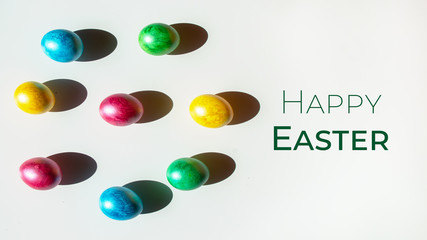 Colorful easter eggs with happy easter word, holiday concept. Happy Easter card.