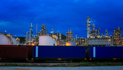 The oil refinery industry, petroleum, petrochemical plants full of technology. And the blue background, orange lights