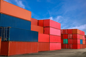 Containers waiting for import, export, and blue sky.