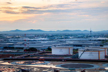 Oil and natural gas storage tanks in an industrial area near the refinery