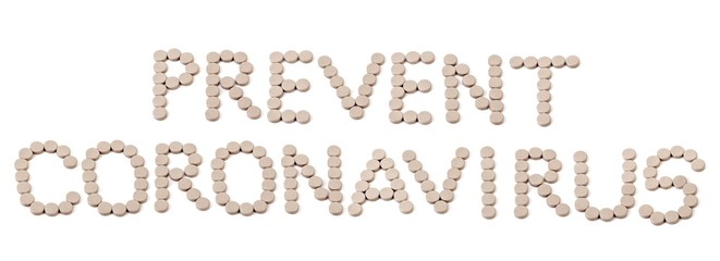 PREVENT CORONAVIRUS - text made of pills