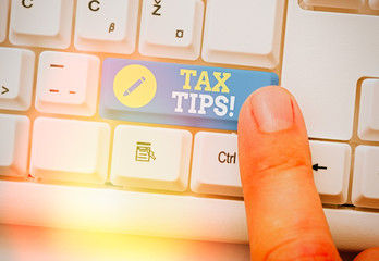 Conceptual hand writing showing Tax Tips. Concept meaning compulsory contribution to state revenue...