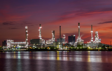Fototapeta na wymiar Oil refinery industry and Petrochemical and natural gas and oil storage tanks, blue background
